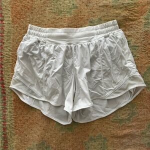 Hot hot short 6 white Lululemon shorts. Great condition! No holes or stains.